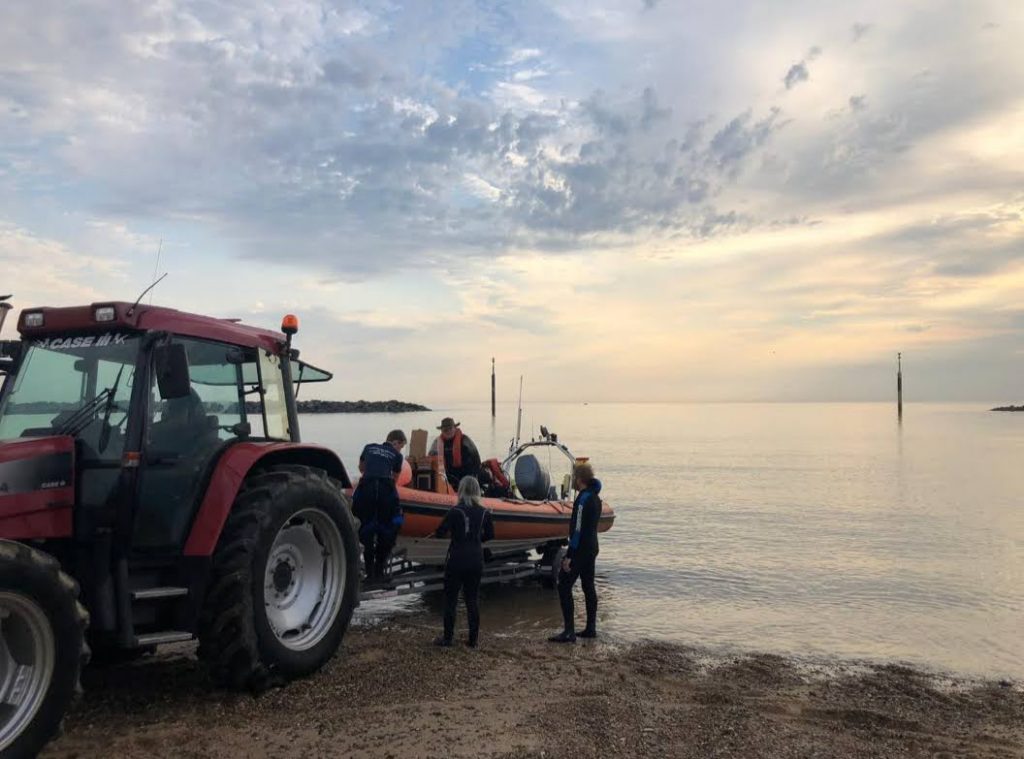 Launching Lowestoft Diver into the sea at Sea Palling with the tractor.